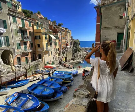 riomaggiore boats and girl